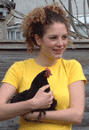 Image of Emily Rolt holding a chicken
