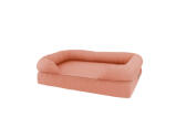 Un lit à traversin en mousse à mémoire de forme medium 36 en rose