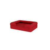 Un lit de chien à traversin rouge sur un fond blanc.