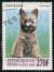Un terrier de cairn sur un timbre d'afrique de l'ouest