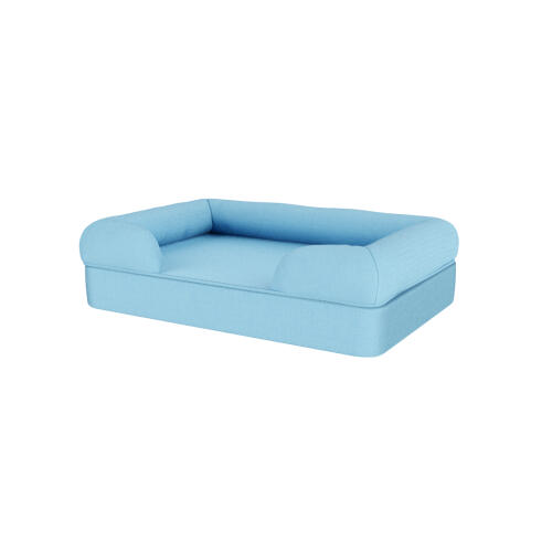 Un lit pour chien en mousse à mémoire de forme bleu clair.