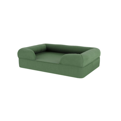 Un lit pour chien en mousse à mémoire de forme verte.